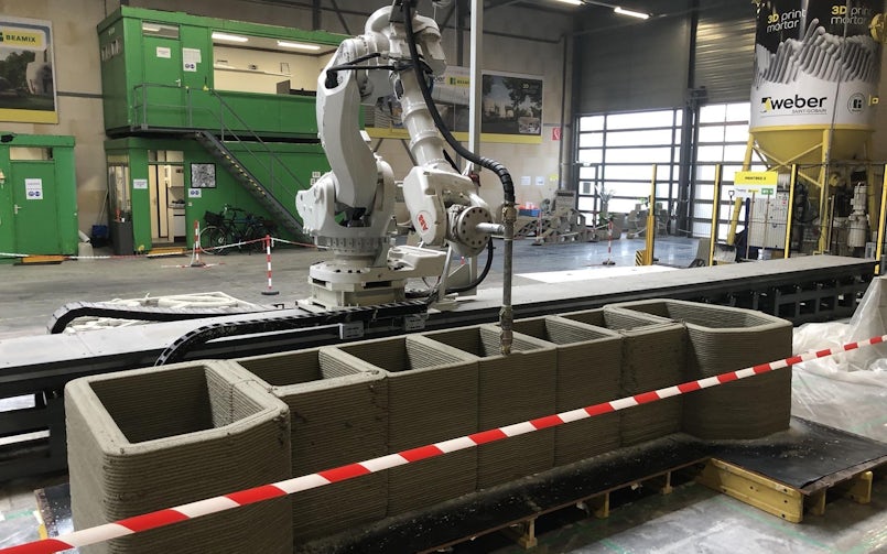 De robotarm van Weber Beamix staat op een track (foto: Weber Beamix)