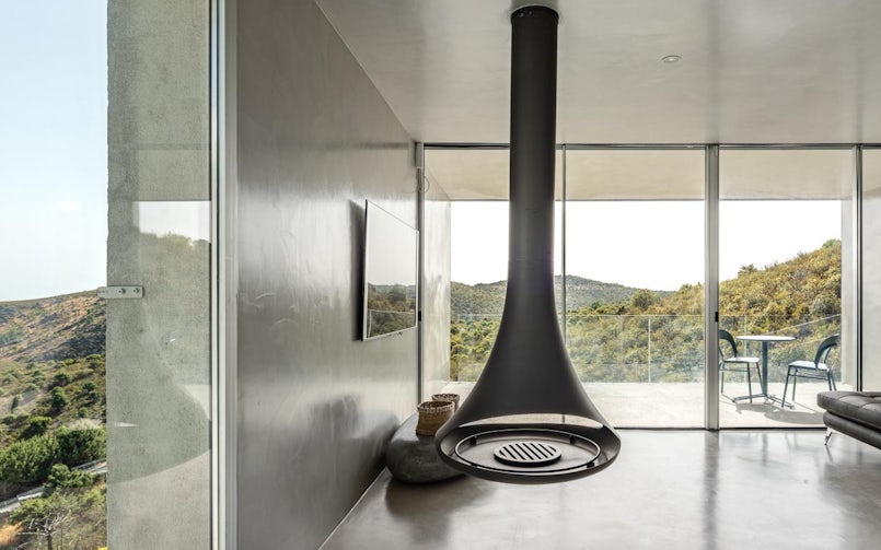 In het interieur werd het beton met cementstuc glad afgewerkt (foto: Javier Orive)